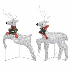 Two silver light-up Christmas reindeer with red ribbons and 40 LEDs on metal stands.