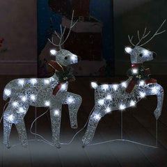 Pair of silver light-up Christmas reindeer with 40 LEDs and red ribbons.