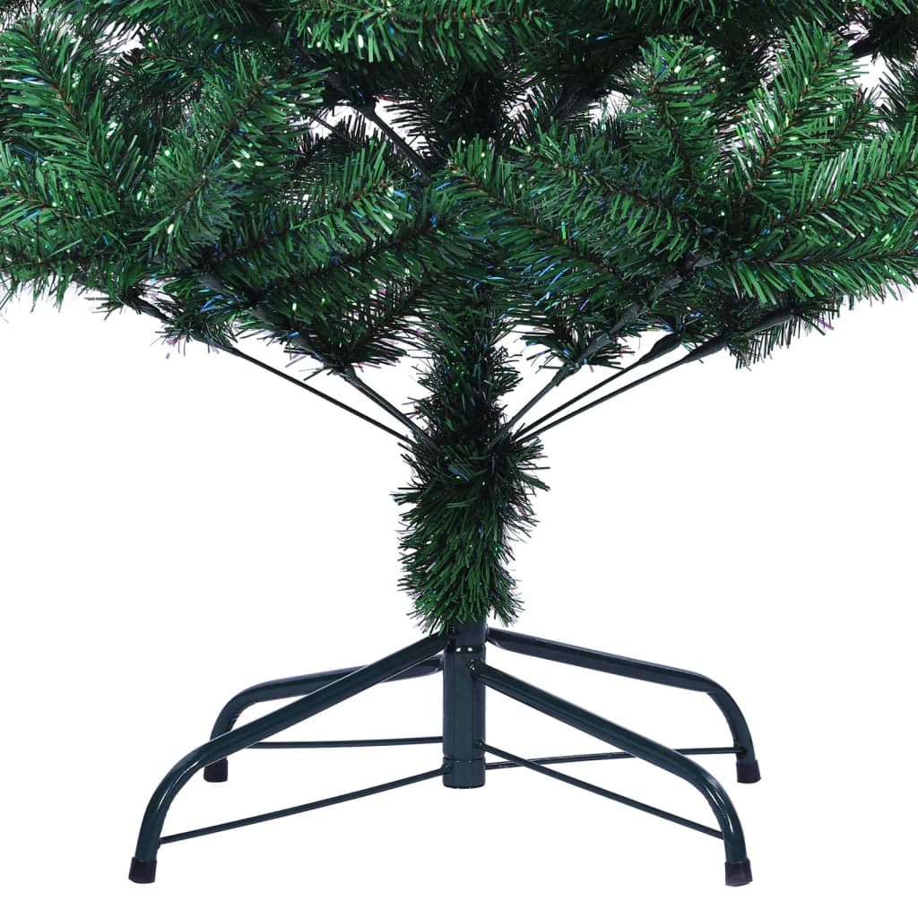 A 7 ft green PVC artificial Christmas tree with iridescent tips on a metal stand.