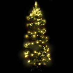 A 6ft green PVC Christmas tree with swirl branches and 160 warm white LED lights.
