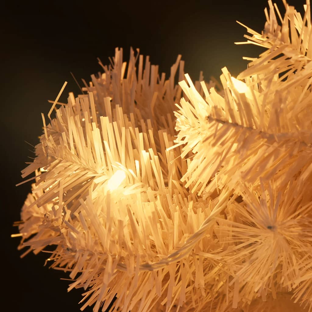 4ft white PVC Christmas tree with swirling branches and warm white pre-lit LED lights in steel pot