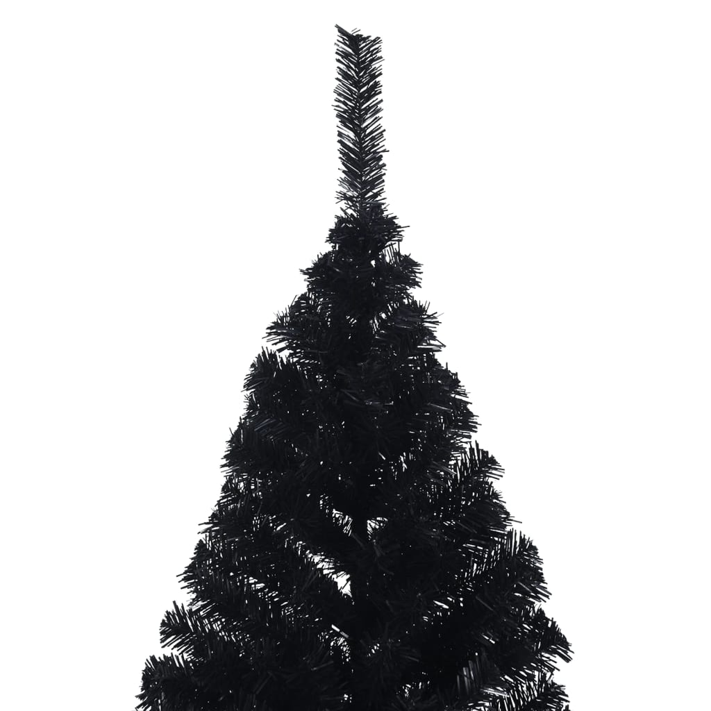 Black silhouette of an 8 ft artificial half Christmas tree on PVC stand.