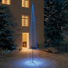 A blue LED-lit Christmas cone tree, 5x16 ft with 732 lights, stands in a snowy yard at night.