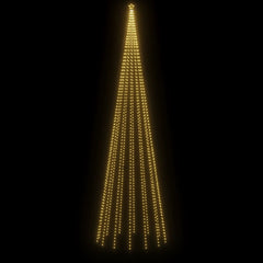 A 26ft tall Christmas cone tree with 1134 warm white LEDs on a black background.