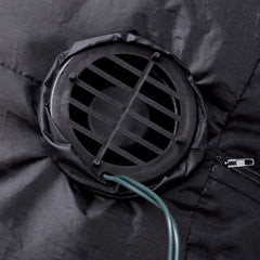 Close-up of black fabric with a circular vent and a zipper on the side of an inflatable Santa Claus.
