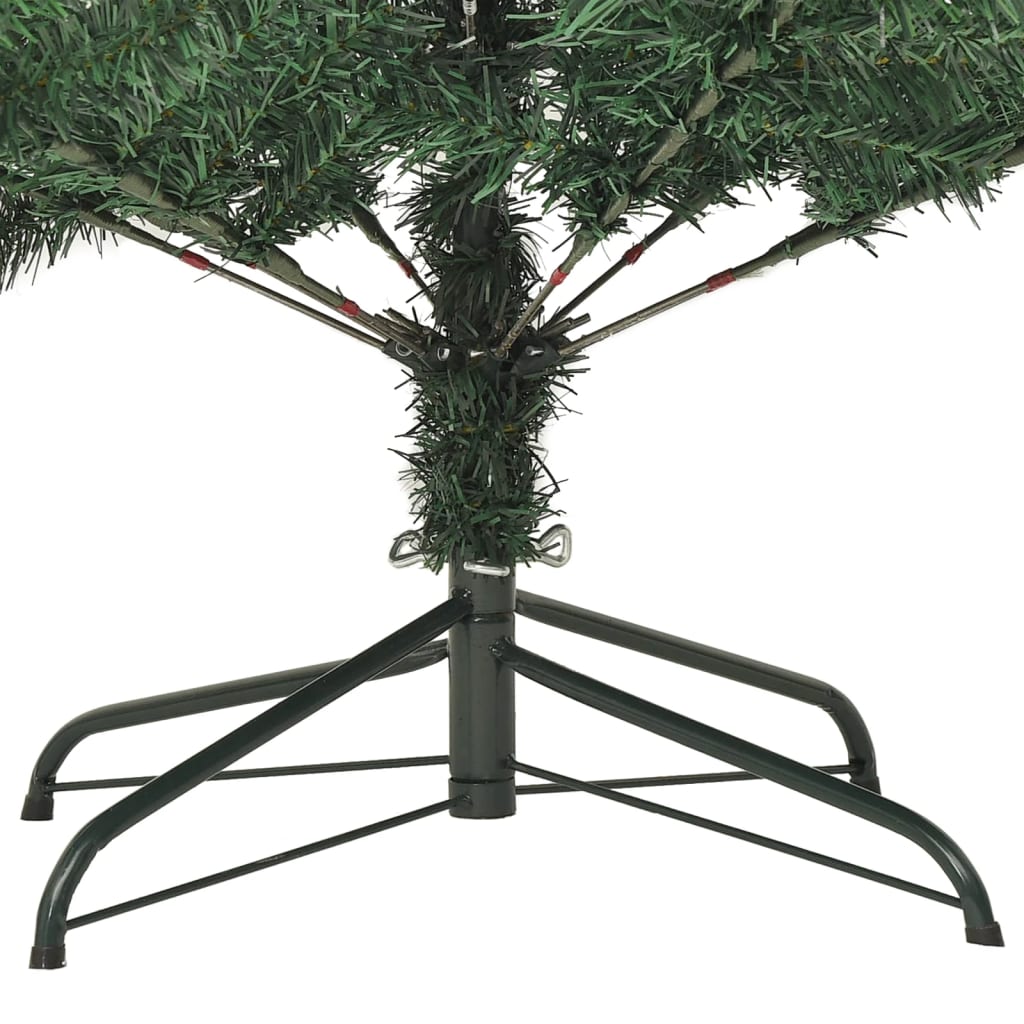 Artificial Christmas tree with green PVC branches and white snow on a sturdy steel stand.