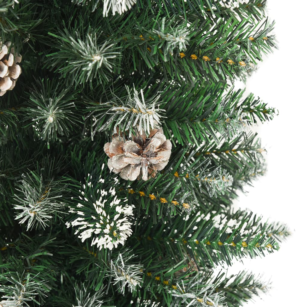 A 7 ft slim artificial Christmas tree in green PVC with snow flocking and pine cones.