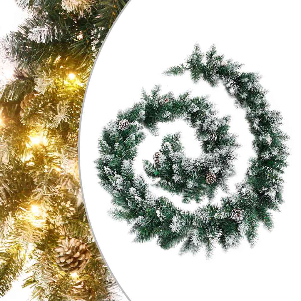 9 ft green PVC Christmas garland with flocked tips, pine cones, and warm white LED lights.