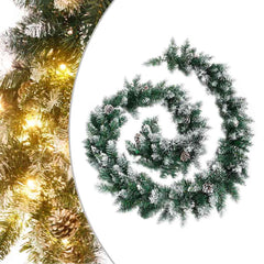 9 ft green PVC Christmas garland with flocked tips, pine cones, and warm white LED lights.