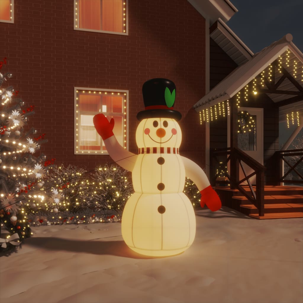 4 ft inflatable snowman with LEDs, made of multicolor Oxford fabric, waving in a snowy yard.