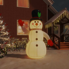 8 ft inflatable snowman with multicolor LED lights and black top hat outdoors at night