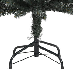 Green 4 ft artificial Christmas tree with snow-dusted PVC tips and metal stand.