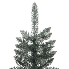 A close-up of the top section of a green artificial Christmas tree with flocked tips.