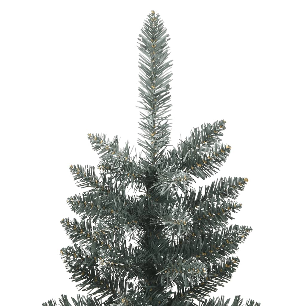 Slim 7ft green artificial Christmas tree with snow-dusted PVC branches and steel stand