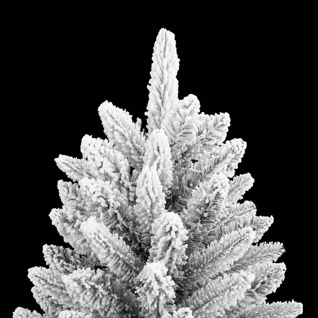 A 5ft artificial Christmas tree with white flocked snow on PVC and PE branches.