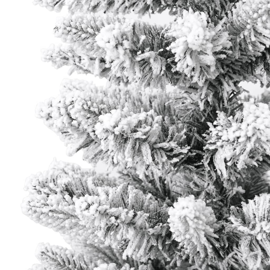 A 5 ft slim artificial Christmas tree with flocked snow on PVC and PE branches.