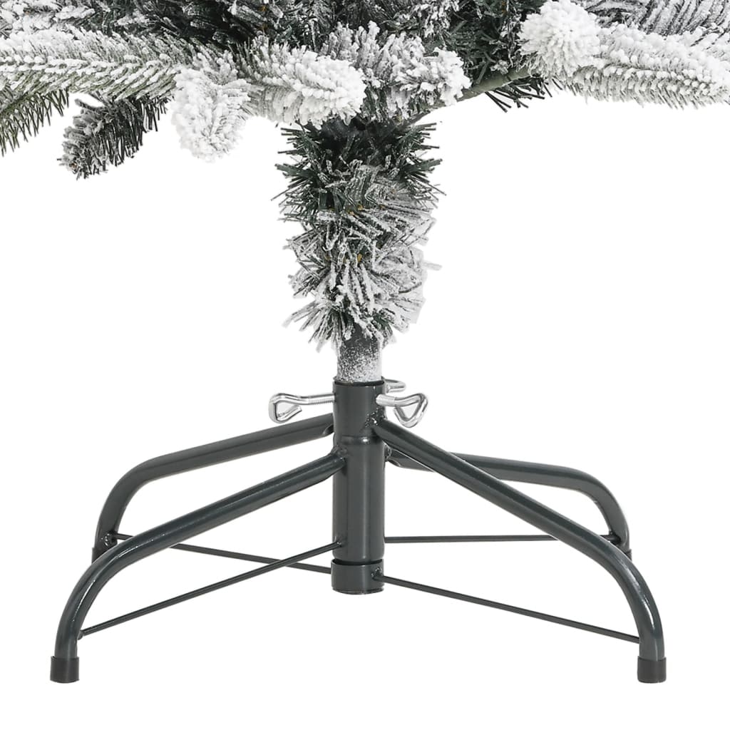Slim 5 ft artificial Christmas tree with flocked snow PVC and PE branches on a metal stand.