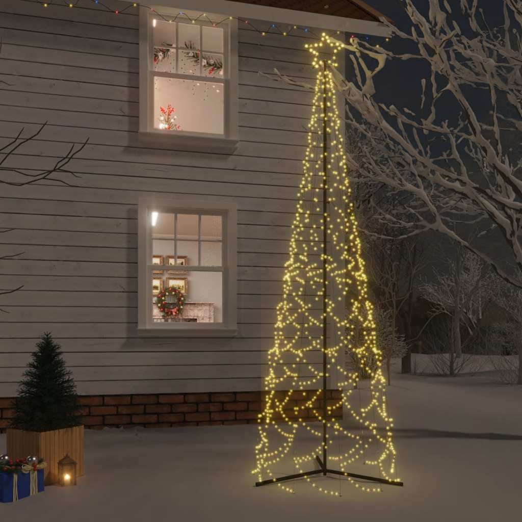 3x10 ft lighted Christmas cone tree with 500 warm white LEDs on a snowy lawn.