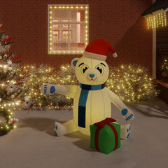 70.9-inch inflatable LED teddy bear in white with red Santa hat, blue scarf, and green gift.