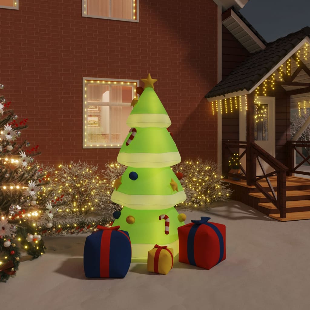 94.5-inch inflatable LED Christmas tree in multicolor Oxford fabric, lit up in a yard with gifts.