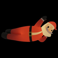 63-inch inflatable lying Santa with multicolor LED lights in red suit and hat.