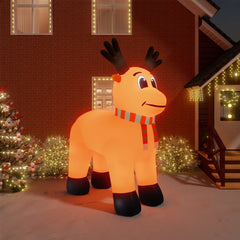 A 157.5-inch tall inflatable LED reindeer in orange with black antlers, scarf, and glowing lights stands in a snowy yard.