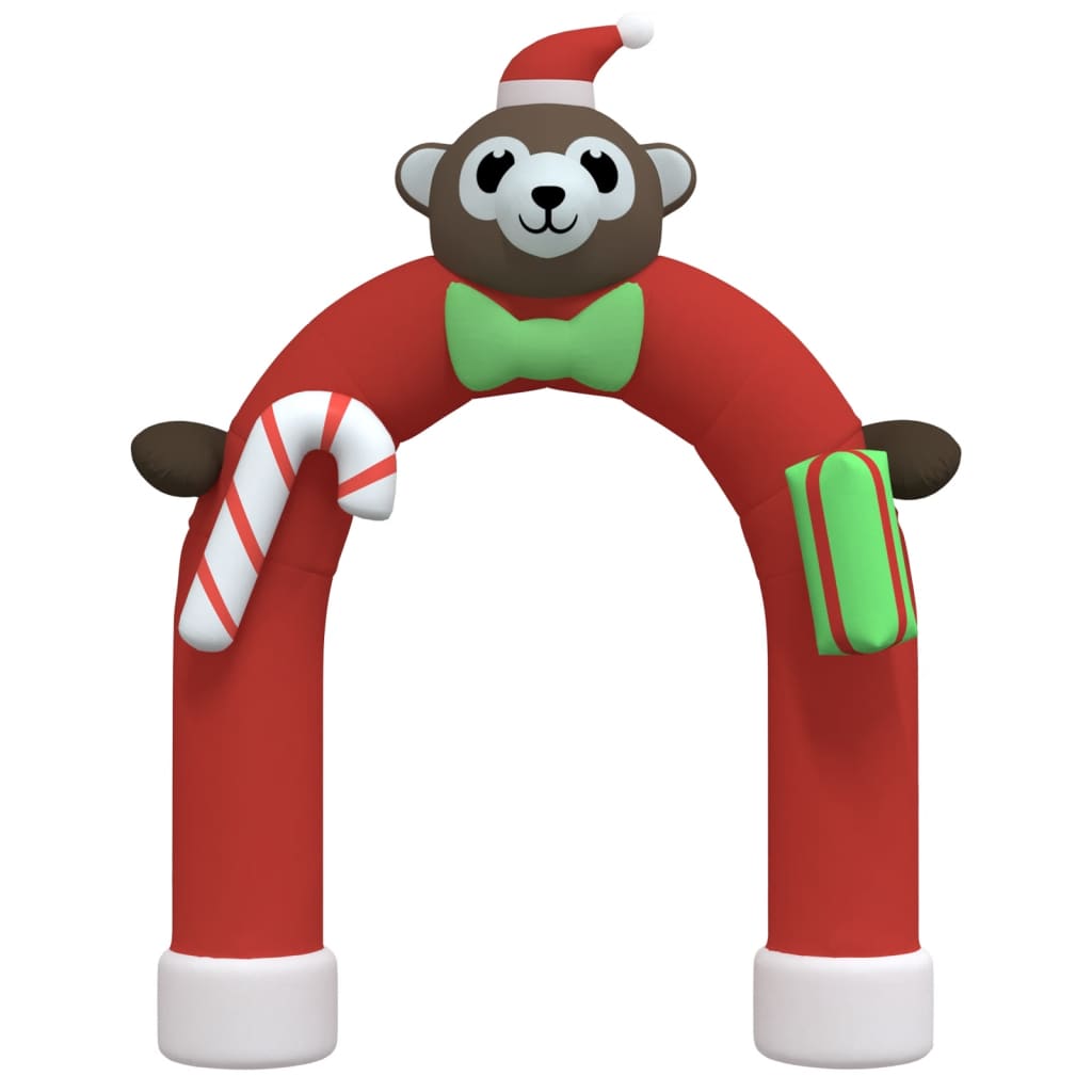 A red inflatable Christmas arch with a monkey wearing a Santa hat, a candy cane, and a gift.