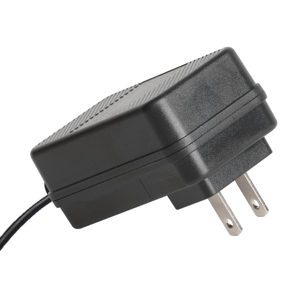 Black power adapter with two metal prongs and attached cable viewed from the side