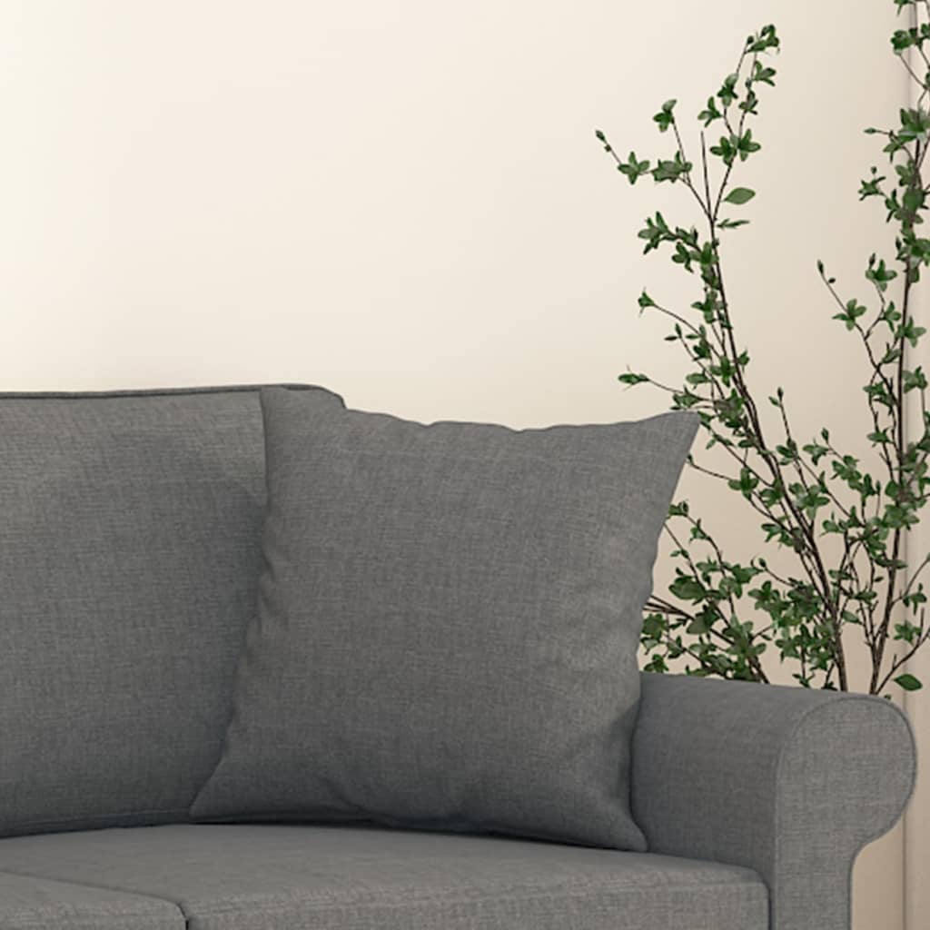Dark gray fabric throw pillows in a 15.7-inch square shape, sold as a two-pack.