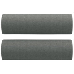 Set of two dark gray fabric bolster throw pillows, each 5.9 by 19.7 inches.