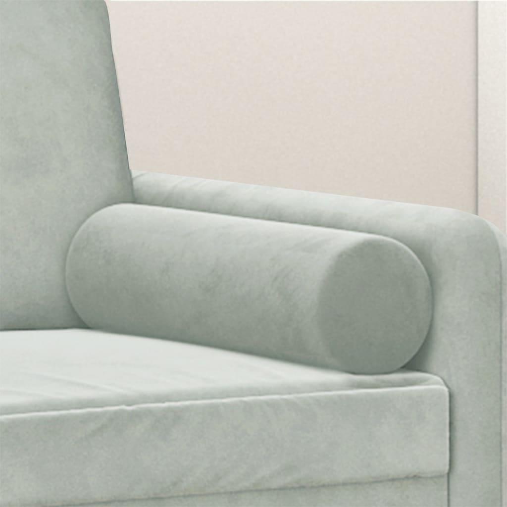 Two light gray velvet cylindrical throw pillows, 5.9x19.7 inches, on a sofa.