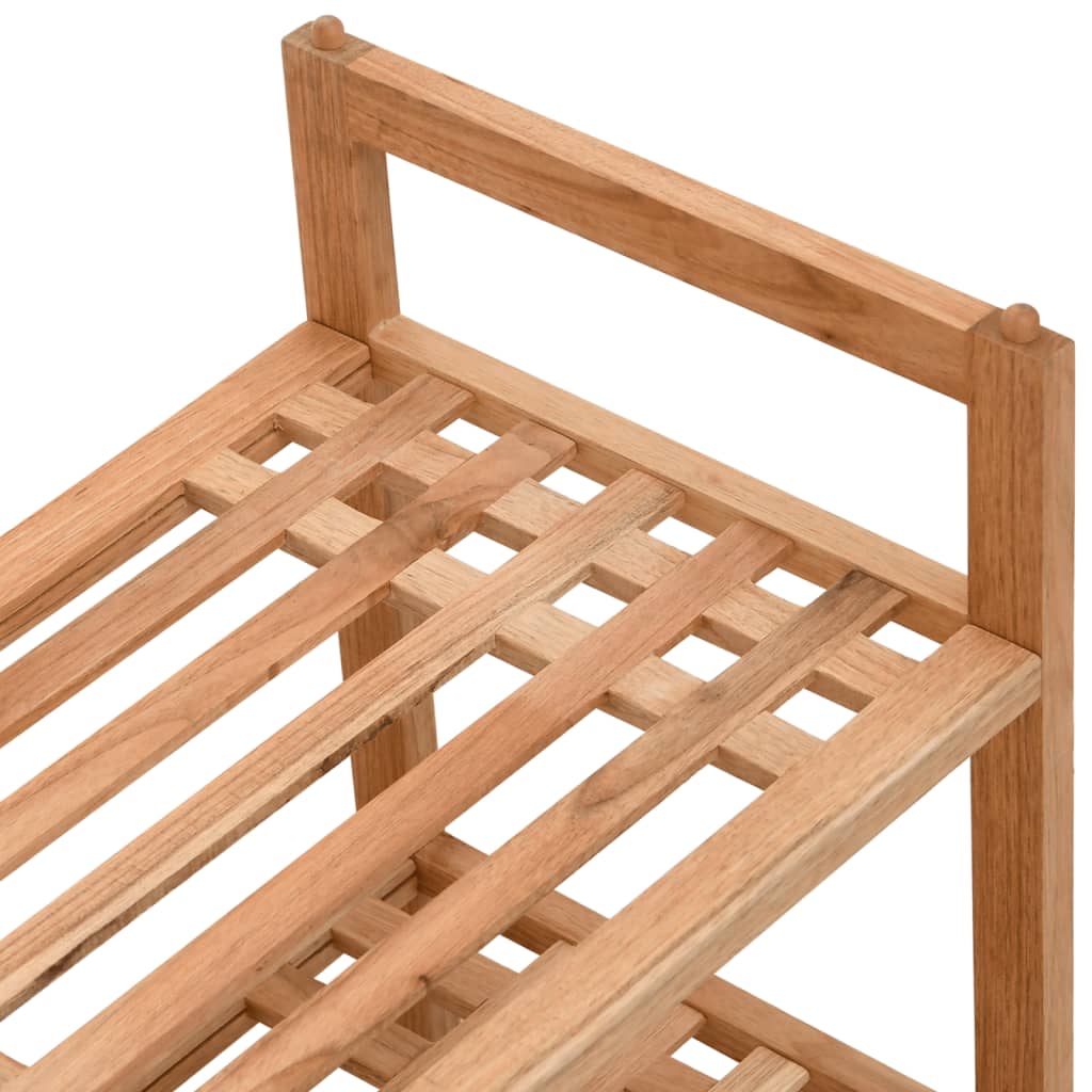 A close-up of a two-tier solid walnut wood shoe rack with slatted shelves.