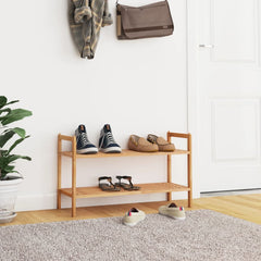 Solid walnut wood shoe rack with two tiers holding sneakers, sandals, and slippers.