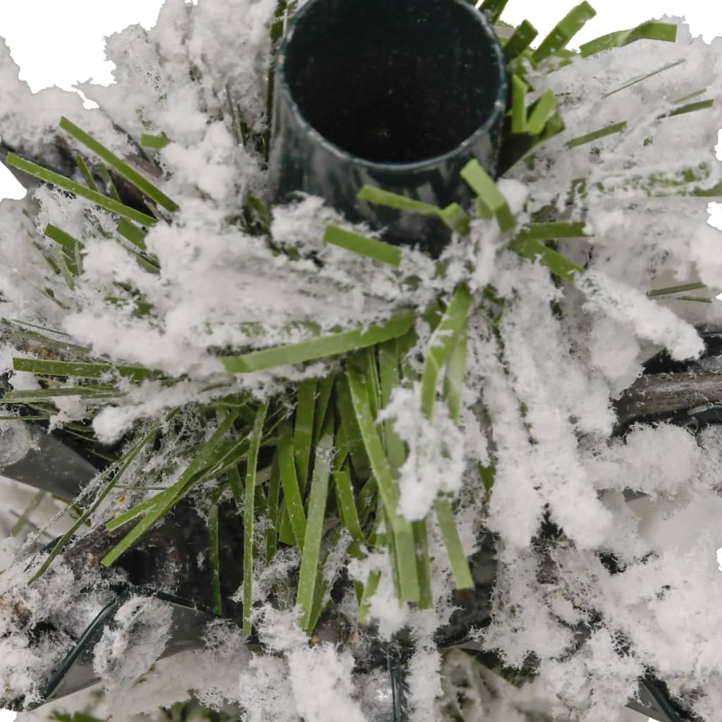 A 94.5-inch flocked snow artificial hinged Christmas tree with green branches and a black stand.