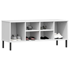 White solid pine wood shoe rack with six compartments and black metal legs holding shoes.