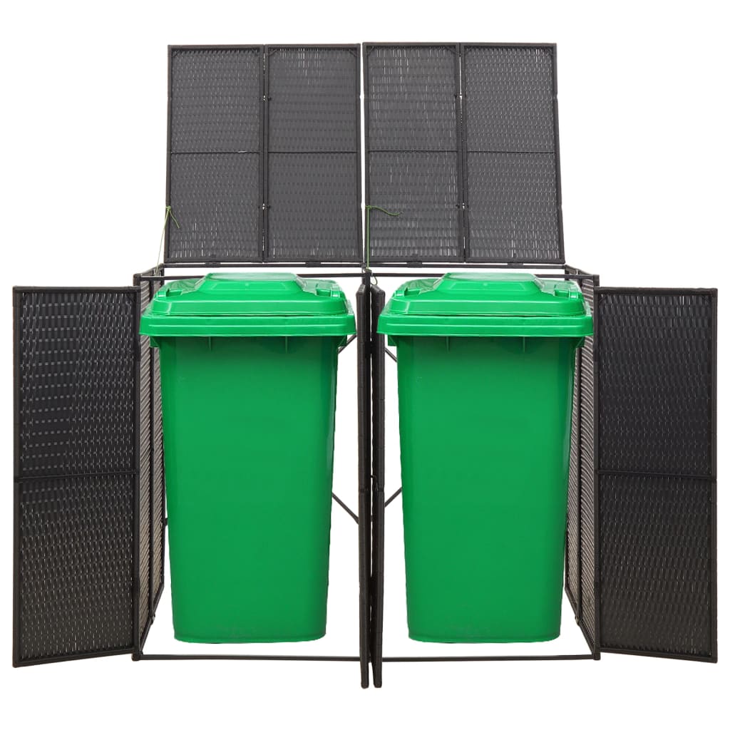 Black poly rattan double wheelie bin shed enclosing two green bins with mesh sides and open top.