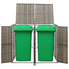 A gray poly rattan double wheelie bin shed with two green bins inside.