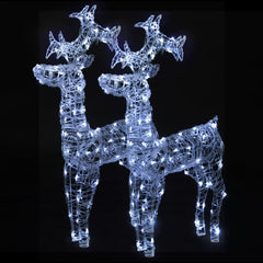 Two 39.4-inch tall acrylic LED reindeer Christmas decorations with white lights.