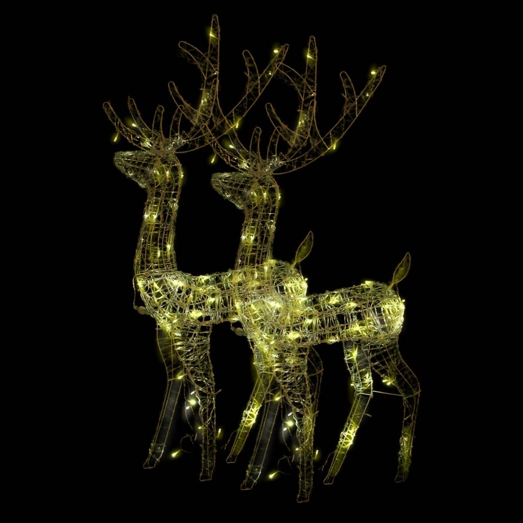 Two 47.2-inch lighted acrylic reindeer decorations with warm white LEDs.