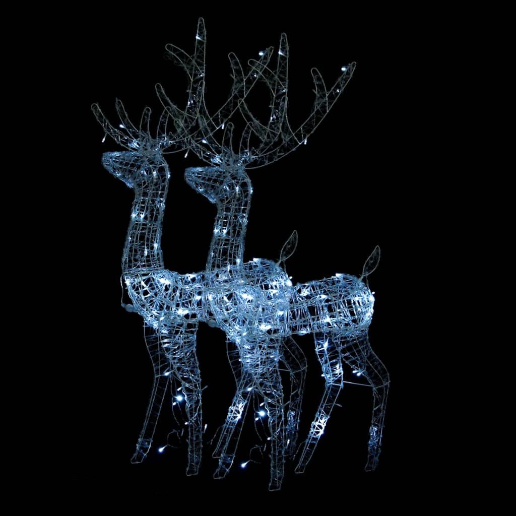 Two lighted acrylic reindeer silhouettes with cold white LEDs for Christmas decor.