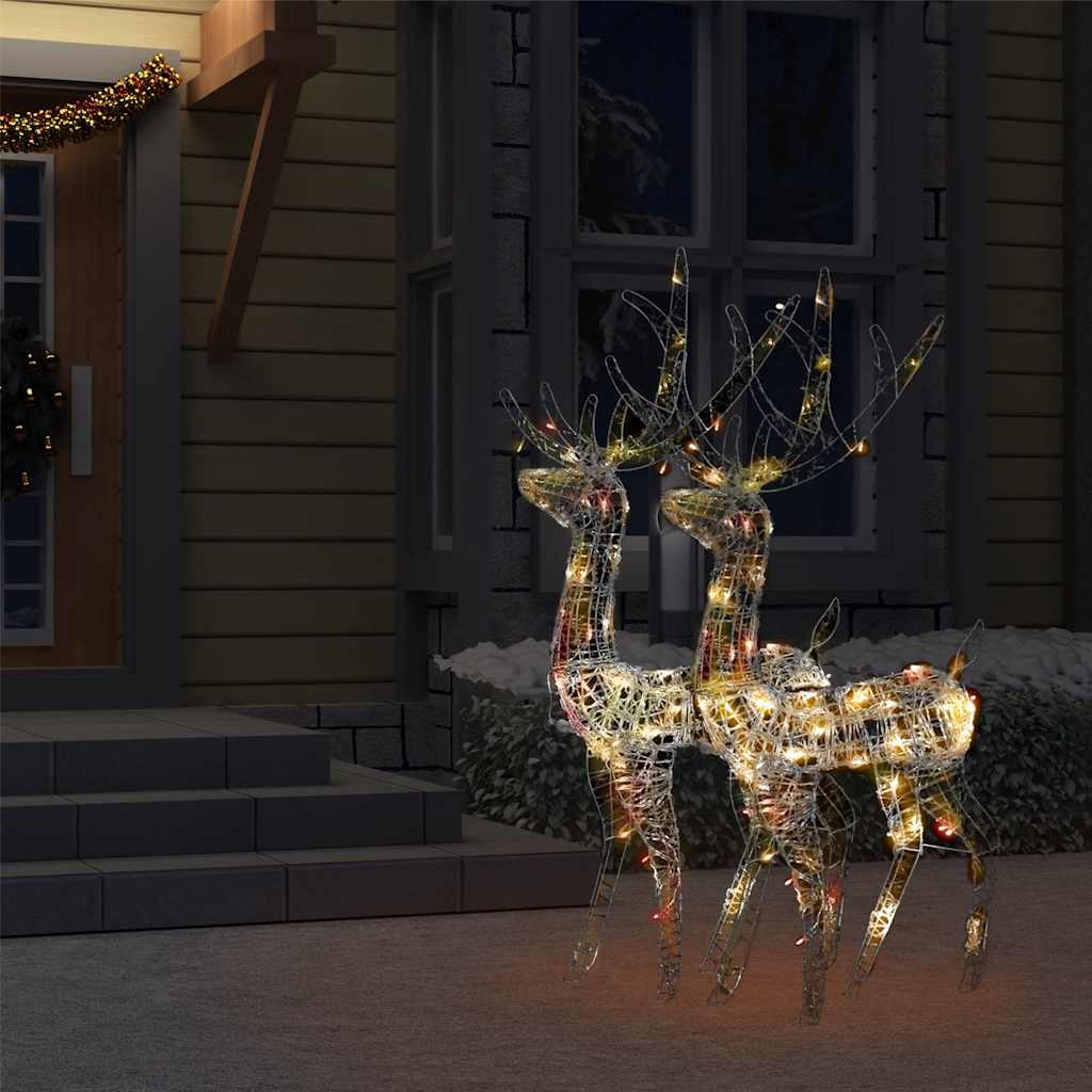 Two 47.2-inch lighted acrylic reindeer figures in multicolor LEDs on a snowy porch.