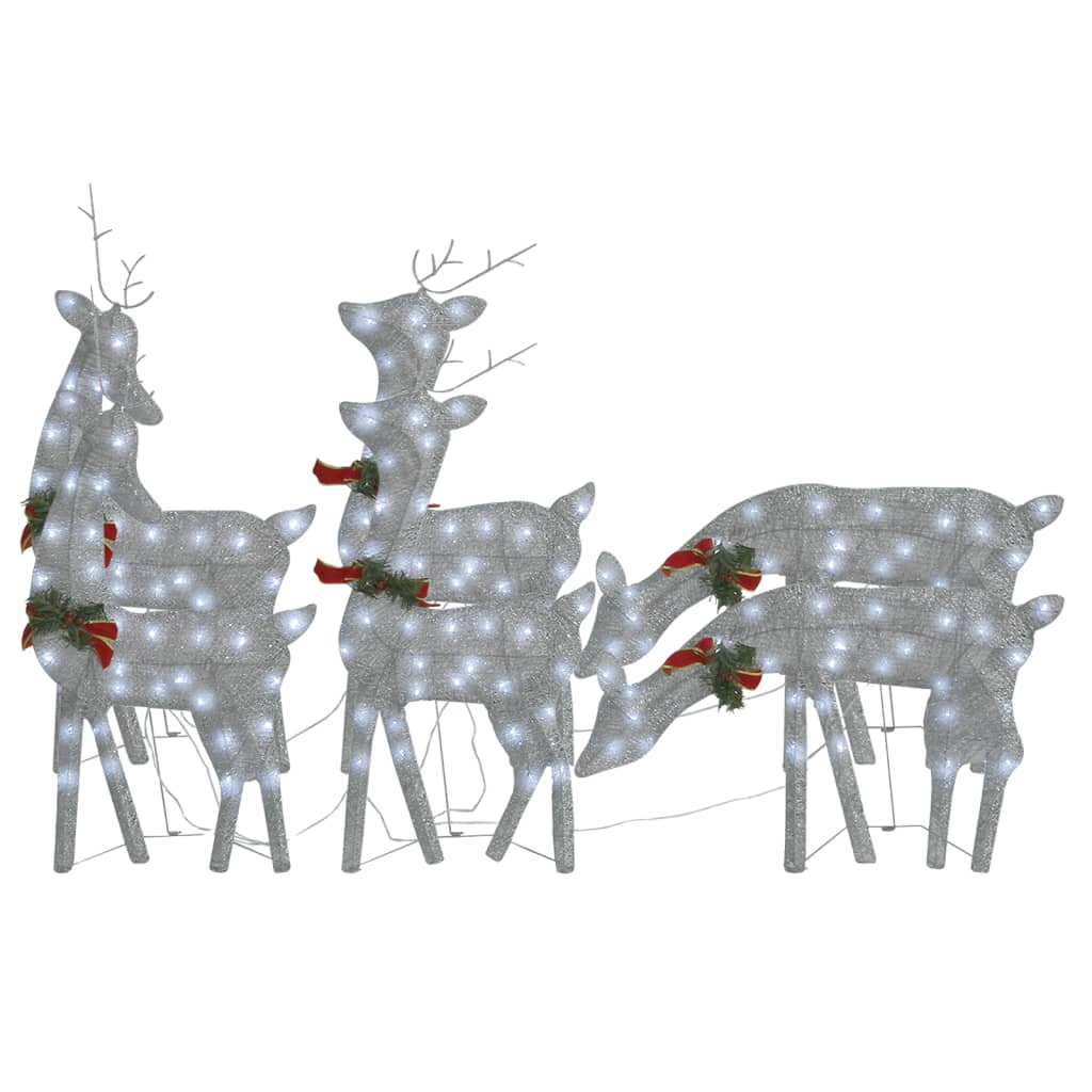 Set of six silver mesh Christmas reindeer with cold white LED lights and red bows.