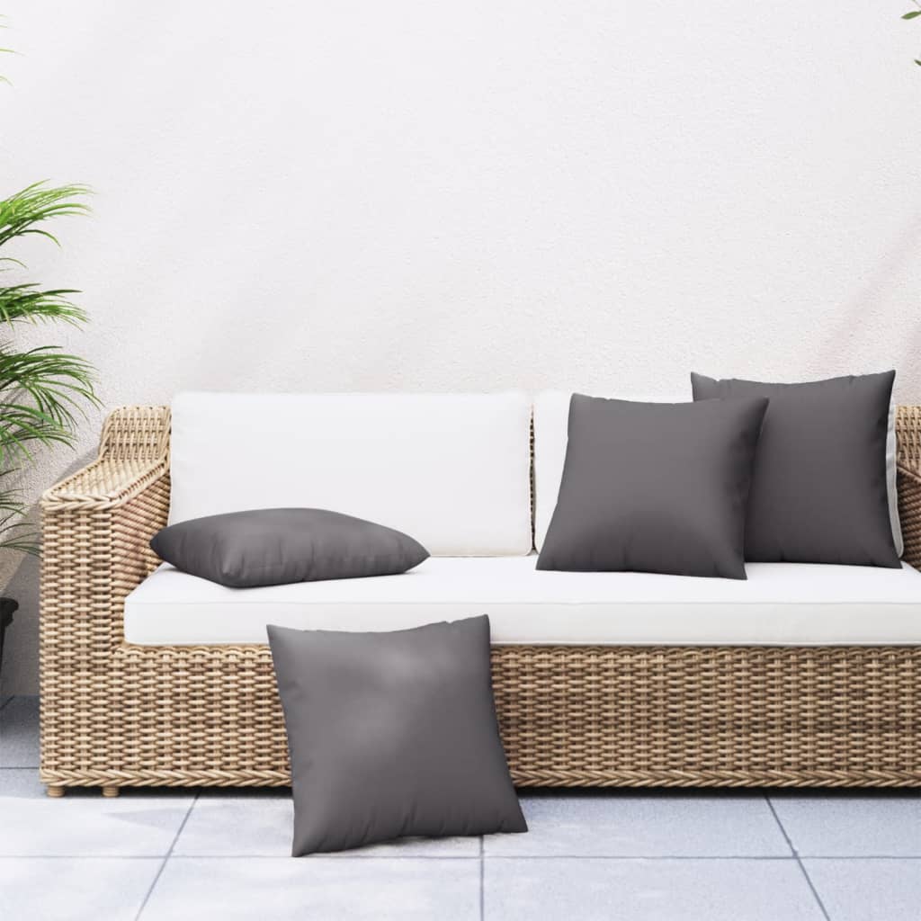 Four anthracite polyester sofa cushions, each 19.7x19.7 inches, on a wicker sofa.