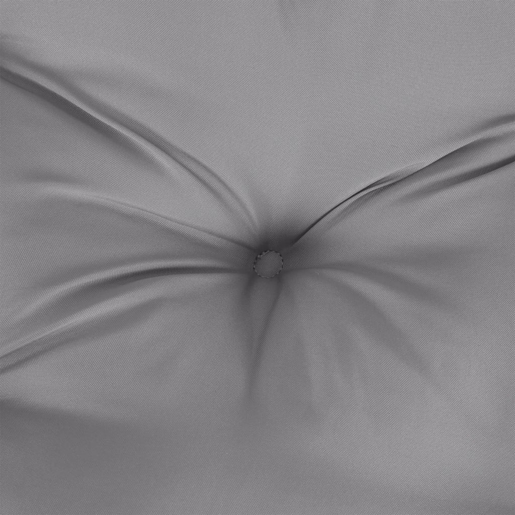 Close-up of gray polyester pallet cushion with tufted center and folded fabric.