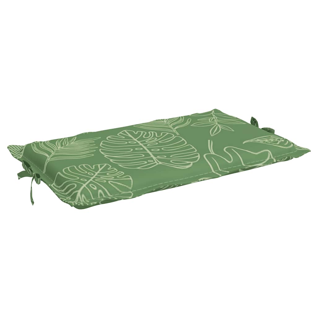 A green sun lounger cushion with a white outline leaf pattern.