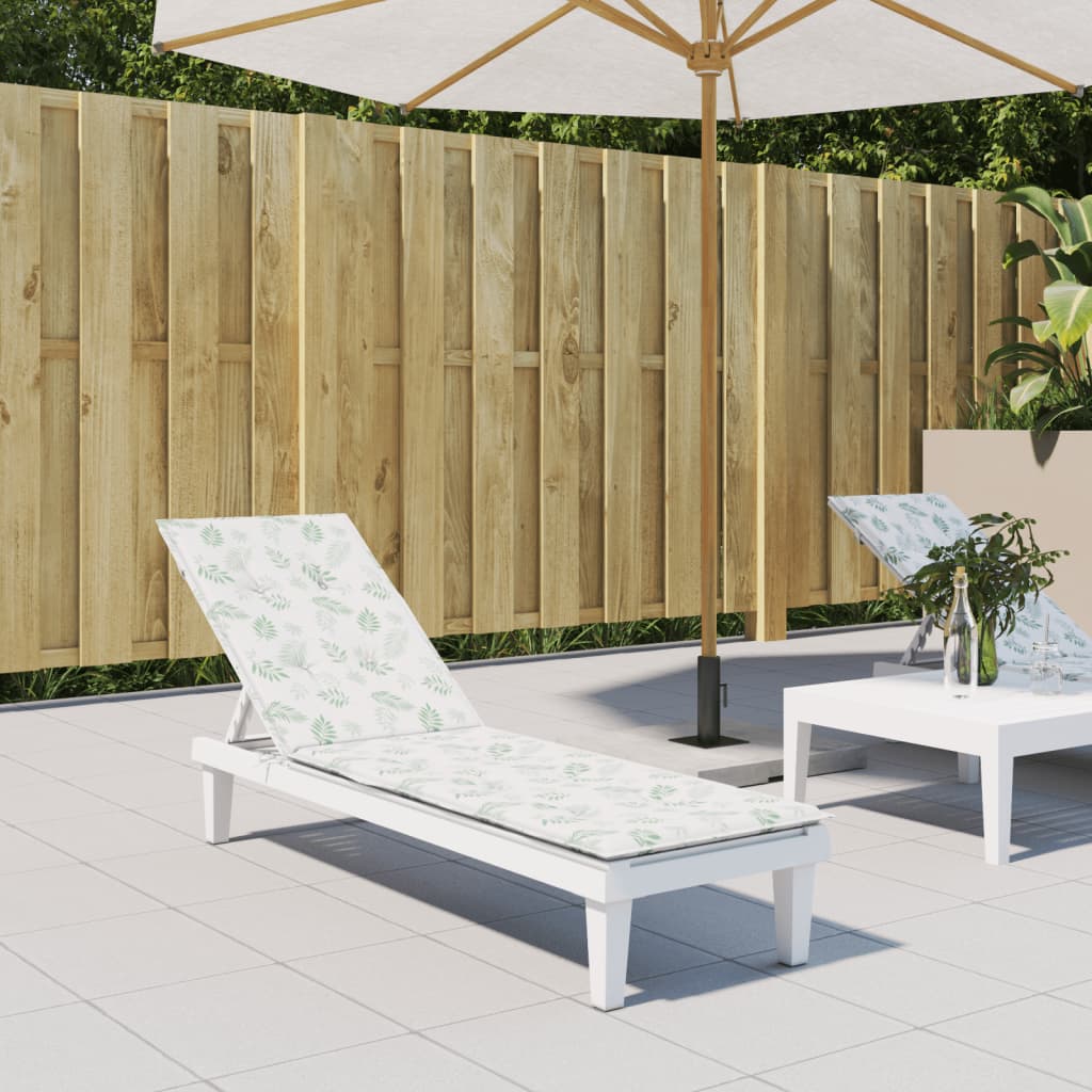 Leaf-pattern Oxford fabric cushion on a white wooden deck chair in an outdoor patio setting.
