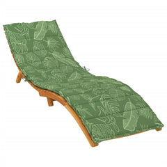 Green leaf-patterned water-resistant cushion on a wooden sun lounger.