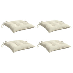 Four cream white outdoor chair cushions with tufted Oxford fabric and ties.