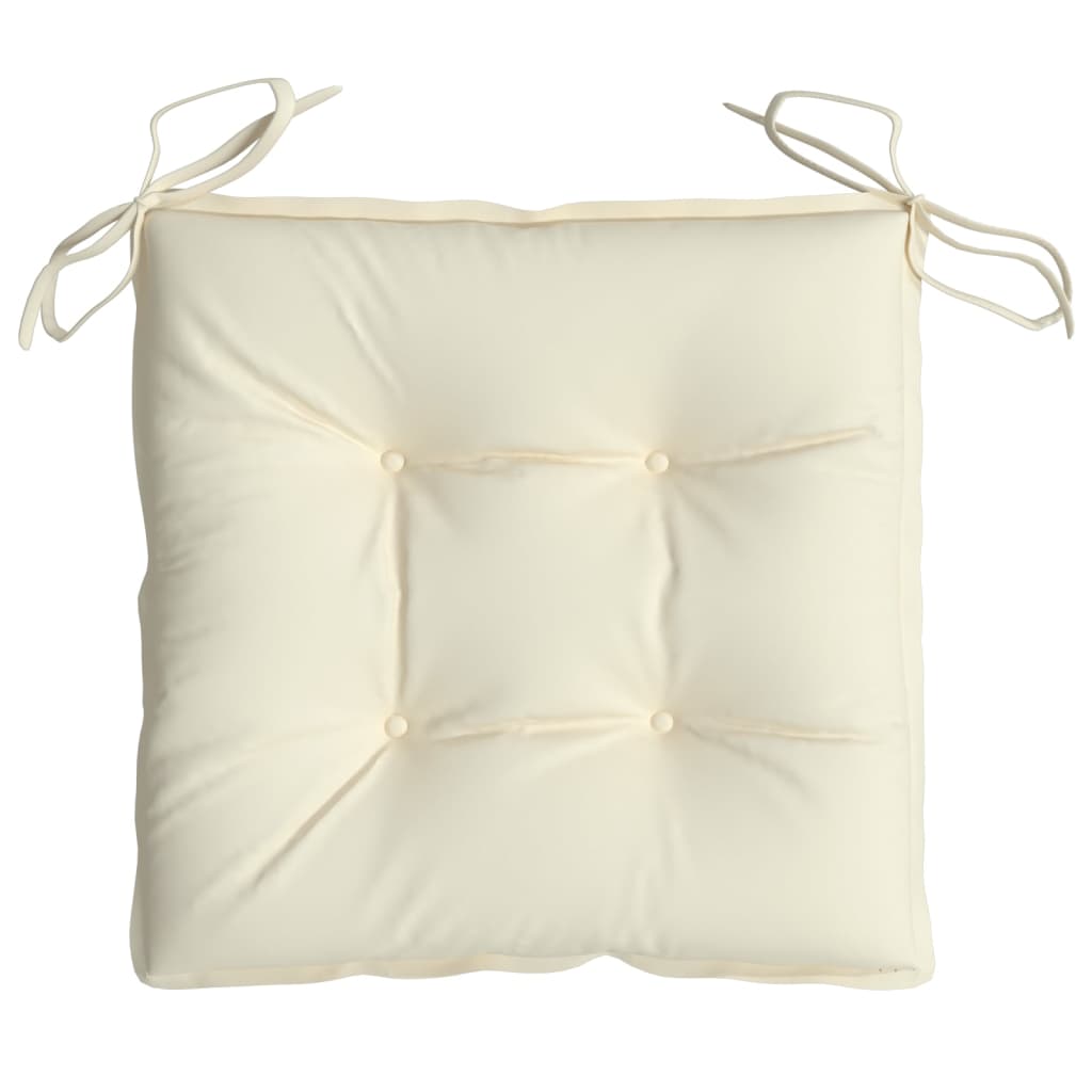 Cream white outdoor chair cushion with tufted Oxford fabric and tie straps.