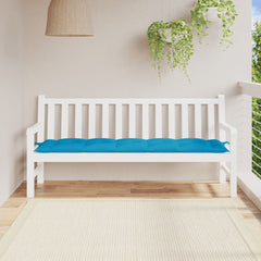 Light blue Oxford fabric garden bench cushion on white bench in sunny balcony setting.